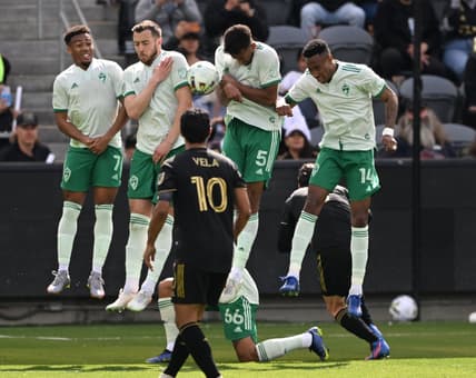 Feb 26, 2022; Los Angeles, California, USA; Los Angeles FC forward Carlos Vela (10) looks on as the Colorado Rapids defend against a free kick during the game at Banc of California Stadium. Mandatory Credit: Jayne Kamin-Oncea-USA TODAY Sports