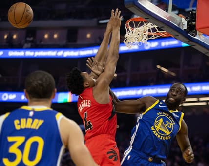 Jan 27, 2023; San Francisco, California, USA; Golden State Warriors forward Draymond Green (23) rejects a shot by Toronto Raptors forward Scottie Barnes (4) during the first quarter at Chase Center. Mandatory Credit: D. Ross Cameron-USA TODAY Sports