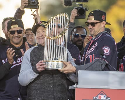 Nov 2, 2019; Washington, DC, USA; Washington Nationals owner Ted Lerner and Washington Nationals first baseman Ryan Zimmerman (11) hold the trophy at World Series Championship Parade. Mandatory Credit: Brad Mills-USA TODAY Sports