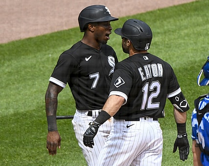 May 16, 2021; Chicago, Illinois, USA;  Chicago White Sox right fielder Adam Eaton (12) celebrates with Chicago White Sox shortstop Tim Anderson (7) after they score on Eaton's two rune home run against the Kansas City Royals during the fifth inning at Guaranteed Rate Field. Mandatory Credit: Matt Marton-USA TODAY Sports