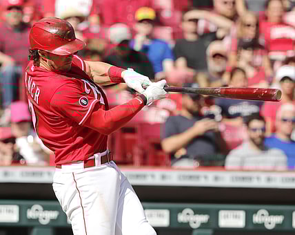 Sep 26, 2021; Cincinnati, Ohio, USA; Cincinnati Reds shortstop Kyle Farmer (17) hits a grand slam against the Washington Nationals during the sixth inning at Great American Ball Park. Mandatory Credit: David Kohl-USA TODAY Sports