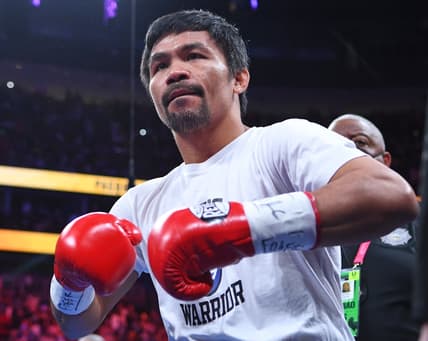Aug 21, 2021; Las Vegas, Nevada; Manny Pacquiao is pictured before the start of a world welterweight championship bout against Yordenis Ugas at T-Mobile Arena. Mandatory Credit: Stephen R. Sylvanie-USA TODAY Sports