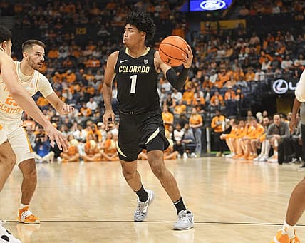 Nov 13, 2022; Nashville, Tennessee, USA;  Colorado Buffaloes guard Julian Hammond III (1) passes the ball against the Tennessee Volunteers during the second half at Bridgestone Arena. Mandatory Credit: Steve Roberts-USA TODAY Sports