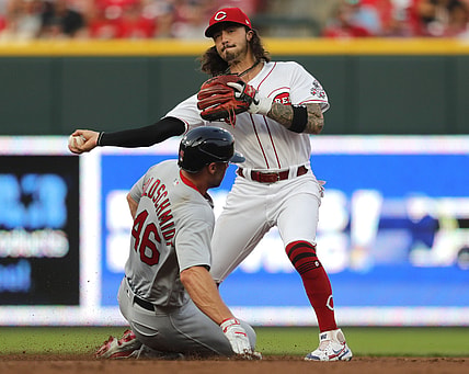Jul 23, 2021; Cincinnati, Ohio, USA; St. Louis Cardinals first baseman Paul Goldschmidt (46) is forced out at second as Cincinnati Reds second baseman Jonathan India (6) throws to first to complete a double play in the third inning at Great American Ball Park. Mandatory Credit: David Kohl-USA TODAY Sports