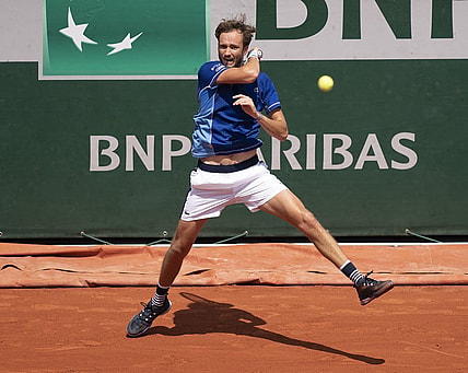 May 28, 2022; Paris, France; Daniil Medvedev returns a shot from Miomir Kecmanovic (SRB) during their match on day seven of the French Open at Stade Roland-Garros. Mandatory Credit: Susan Mullane-USA TODAY Sports