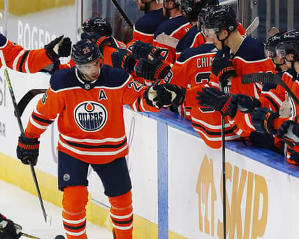 Mar 12, 2021; Edmonton, Alberta, CAN; Edmonton Oilers defensemen Darnell Nurse (25) celebrates a second period goal against the Ottawa Senators at Rogers Place. Mandatory Credit: Perry Nelson-USA TODAY Sports