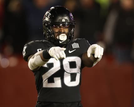 Nov 26, 2021; Ames, Iowa, USA; Iowa State Cyclones running back Breece Hall (28) celebrates after scoring a touchdown against the TCU Horned Frogs at Jack Trice Stadium. Mandatory Credit: Reese Strickland-USA TODAY Sports