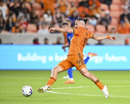 Apr 9, 2022; Houston, Texas, USA; Houston Dynamo forward Sebastian Ferreira (9) kicks the ball against San Jose Earthquakes at PNC Stadium. Mandatory Credit: Maria Lysaker-USA TODAY Sports