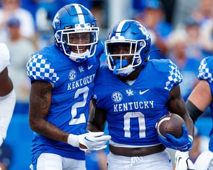 Sep 17, 2022; Lexington, Kentucky, USA; Kentucky Wildcats wide receiver Barion Brown (2) celebrates with running back Kavosiey Smoke (0) after a touchdown is scored during the game against the Youngstown State Penguins at Kroger Field. Mandatory Credit: Jordan Prather-USA TODAY Sports