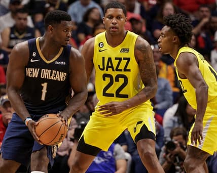 Oct 23, 2022; New Orleans, Louisiana, USA;  New Orleans Pelicans forward Zion Williamson (1) posts up against Utah Jazz forward Rudy Gay (22) and guard Mike Conley (11) during the second half at Smoothie King Center. Mandatory Credit: Stephen Lew-USA TODAY Sports