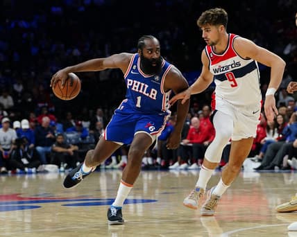 Nov 2, 2022; Philadelphia, Pennsylvania, USA; Philadelphia 76ers guard James Harden (1) dribbles against Washington Wizards forward Deni Avdija (9) during the second half at Wells Fargo Center. Mandatory Credit: Gregory Fisher-USA TODAY Sports