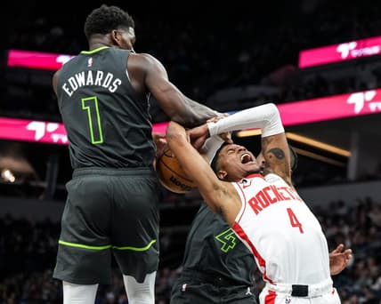Jan 21, 2023; Minneapolis, Minnesota, USA; Houston Rockets guard Jalen Green (4) is blocked by Minnesota Timberwolves guard Anthony Edwards (1) and guard Jaylen Nowell (4) during the second quarter at Target Center. Mandatory Credit: Brace Hemmelgarn-USA TODAY Sports