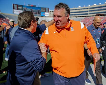 Illinois head coach Bret Bielema celebrates with a supporter as he heads to the locker room after a game against Wisconsin on Saturday, October 1, 2022, at Camp Randall Stadium in Madison, Wis. Illinois won the game, 34-10, in Bielema   s return to Madison after coaching the Badgers from 2006-2012.Tork Mason/USA TODAY NETWORK-Wisconsin

Usat Wisconsin Vs Illinois Football 100122 2932 Ttm