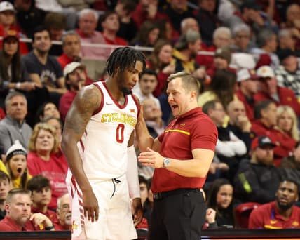 Jan 9, 2024; Ames, Iowa, USA; Iowa State Cyclones head coach TJ Otzelberger talks to Iowa State Cyclones forward Tre King (0) during a timeout during their game with the Houston Cougars at James H. Hilton Coliseum. Mandatory Credit: Reese Strickland-USA TODAY Sports
