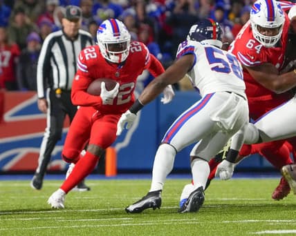 Oct 15, 2023; Orchard Park, New York, USA; New York Giants linebacker Bobby Okereke (58) tackles Buffalo Bills running back Damien Harris (22) during the first half at Highmark Stadium. Mandatory Credit: Gregory Fisher-USA TODAY Sports