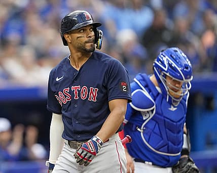 Jun 29, 2022; Toronto, Ontario, CAN; Boston Red Sox shortstop Xander Bogaerts (2) reacts after striking out against the Toronto Blue Jays during the second inning at Rogers Centre. Mandatory Credit: Kevin Sousa-USA TODAY Sports