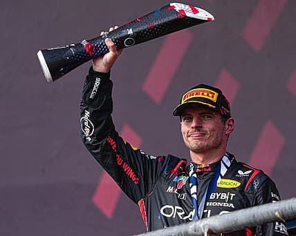 Oracle Red Bull Racing driver Max Verstappen hoists the trophy after winning the Formula 1 Lenovo United States Grand Prix at Circuit of Americas on Sunday Oct. 22, 2023.