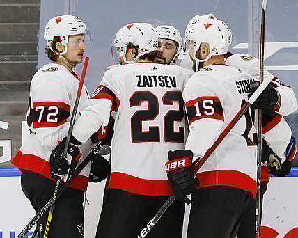 Feb 2, 2021; Edmonton, Alberta, CAN; Ottawa Senators players celebrate a second period goal by forward Cedric Paquette (23) against the Edmonton Oilers at Rogers Place. Mandatory Credit: Perry Nelson-USA TODAY Sports
