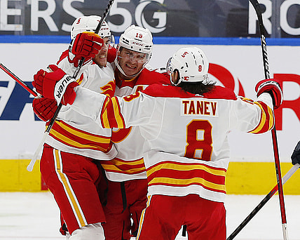 Mar 6, 2021; Edmonton, Alberta, CAN; Calgary Flames defensemen Noah Hanifin (55) celebrates after a third period goal against the Edmonton Oilers at Rogers Place. Mandatory Credit: Perry Nelson-USA TODAY Sports