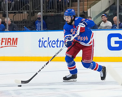 Jan 2, 2022; New York, New York, USA; New York Rangers center Mika Zibanejad (93) skates with the puck during the first period against the Tampa Bay Lightning at Madison Square Garden. Mandatory Credit: Gregory Fisher-USA TODAY Sports