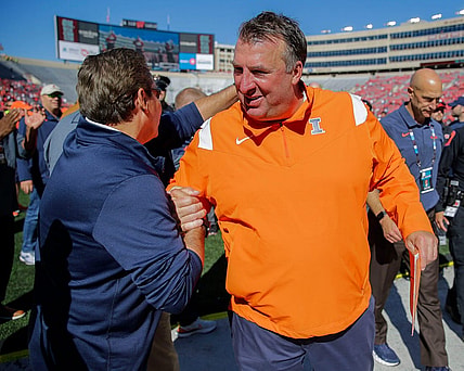 Illinois head coach Bret Bielema celebrates with a supporter as he heads to the locker room after a game against Wisconsin on Saturday, October 1, 2022, at Camp Randall Stadium in Madison, Wis. Illinois won the game, 34-10, in Bielema   s return to Madison after coaching the Badgers from 2006-2012.Tork Mason/USA TODAY NETWORK-Wisconsin

Usat Wisconsin Vs Illinois Football 100122 2932 Ttm