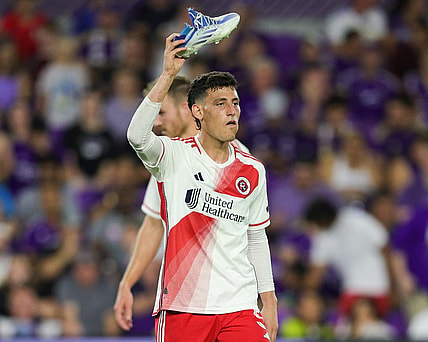 Oct 7, 2023; Orlando, Florida, USA;  New England Revolution forward Tomas Chancalay (5) reacts after breaking a shoe against Orlando City SC in the second half at Exploria Stadium. Mandatory Credit: Nathan Ray Seebeck-USA TODAY Sports