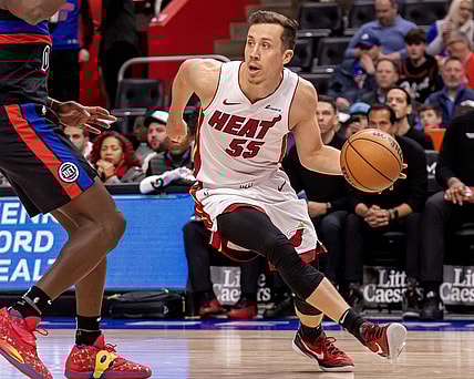 Mar 15, 2024; Detroit, Michigan, USA; Miami Heat forward Duncan Robinson (55) dribbles the ball against the Detroit Pistons during the first quarter at Little Caesars Arena. Mandatory Credit: David Reginek-USA TODAY Sports