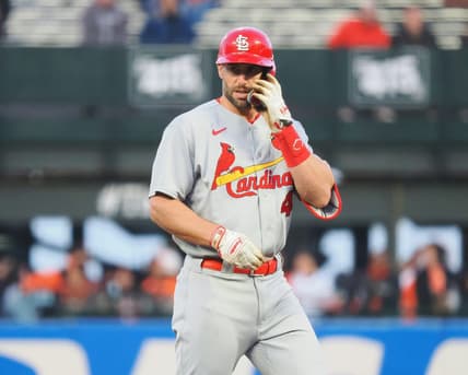 Apr 24, 2023; San Francisco, California, USA; St. Louis Cardinals first baseman Paul Goldschmidt (46) adjusts his helmet after hitting a double against the San Francisco Giants during the fourth inning at Oracle Park. Mandatory Credit: Kelley L Cox-USA TODAY Sports