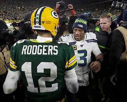 Seattle Seahawks QB Russell Wilson and Green Bay Packers QB Aaron Rodgers during NFL season
