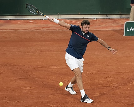 Sep 27, 2020; Paris, France; Stanislas Wawrinka (SUI) in action during his match against Andy Murray (GBR) on day one at Stade Roland Garros. Mandatory Credit: Susan Mullane-USA TODAY Sports