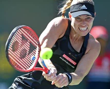 Oct 11, 2021; Indian Wells, CA, USA; Angelique Kerber (GER) hits a shot during her third round match against Daria Kasatkina (RUS) in the BNP Paribas Open  at the Indian Wells Tennis Garden. Mandatory Credit: Jayne Kamin-Oncea-USA TODAY Sports