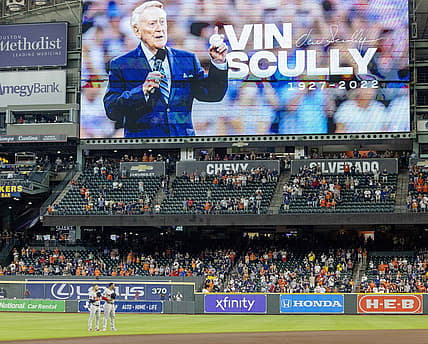 Aug 3, 2022; Houston, Texas, USA; Players and fans stand for a moment of silence for the passing of Vin Scully before the Houston Astros played against the Boston Red Sox at Minute Maid Park. Mandatory Credit: Thomas Shea-USA TODAY Sports