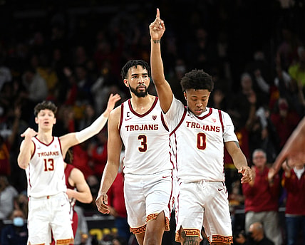 Feb 20, 2022; Los Angeles, California, USA;  USC Trojans guard Boogie Ellis (0) celebrates after shooting the winning basket with seconds on the clock to defeat the Washington State Cougars at Galen Center. Mandatory Credit: Jayne Kamin-Oncea-USA TODAY Sports
