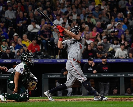Sep 30, 2023; Denver, Colorado, USA; Minnesota Twins right fielder Max Kepler (26) hits a three run home run in the sixth inning against the Colorado Rockies at Coors Field. Mandatory Credit: John Leyba-USA TODAY Sports