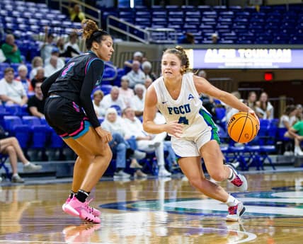 Dolly Cairns #4 of the Florida Gulf Coast University women  s basketball team drives to the basket in a win over Florida International University at FGCU on Tuesday, Nov. 14, 2023.