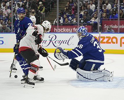 Oct 16, 2021; Toronto, Ontario, CAN; Ottawa Senators forward Tyler Ennis (63) and Toronto Maple Leafs defenseman Timothy Liljegren (37) and goaltender Jack Campbell (36) look for the puck during the first period at Scotiabank Arena. Mandatory Credit: John E. Sokolowski-USA TODAY Sports