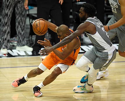 Jun 26, 2021; Los Angeles, California, USA; Phoenix Suns guard Chris Paul (3) is fouled by Los Angeles Clippers guard Patrick Beverley (21) in the second half of game four of the Western Conference Finals for the 2021 NBA Playoffs at Staples Center. Mandatory Credit: Jayne Kamin-Oncea-USA TODAY Sports