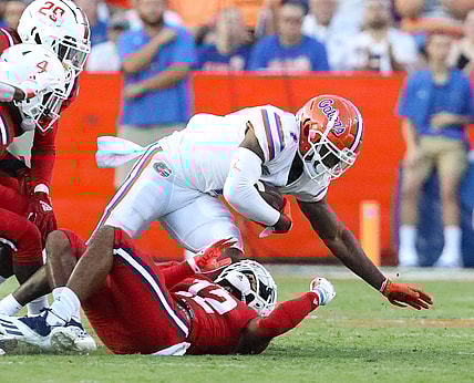 Florida Gators wide receiver Jacob Copeland (1) is brought down after making a catch during a game against the Florida Atlantic Owls at Ben Hill Griffin Stadium in Gainesville Fla. Sept. 4, 2021.

UFfauGameAction22