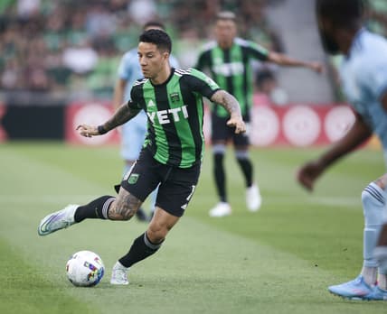 Apr 10, 2022; Austin, Texas, USA;  Austin FC forward Sebastian Driussi (7) plays the ball against the  Minnesota United FC in the first half at Q2 Stadium. Mandatory Credit: Erich Schlegel-USA TODAY Sports