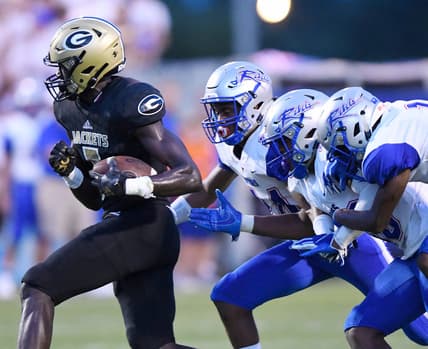 Greer   s Jaleel Skinner (5) picks up yards after a catch against Byrnes Friday, August 23, 2019, at Greer's Dooley Field.

Greer Byrnes Football