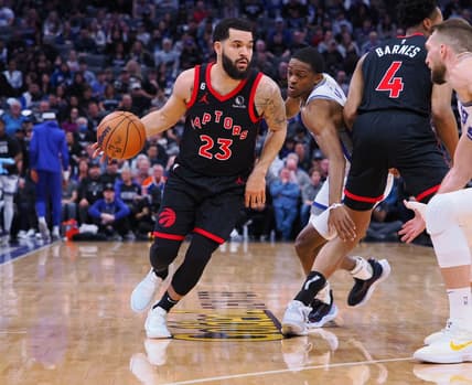 Jan 25, 2023; Sacramento, California, USA; Toronto Raptors point guard Fred VanVleet (23) controls the ball as power forward Scottie Barnes (4) sets a screen against Sacramento Kings point guard De'Aaron Fox (5) during the first quarter at Golden 1 Center. Mandatory Credit: Kelley L Cox-USA TODAY Sports