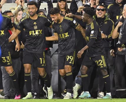Mar 25, 2023; Los Angeles, California, USA; Los Angeles FC celebrates after a goal by forward Denis Bouanga (99) in the second half against the FC Dallas at BMO Stadium. Mandatory Credit: Jayne Kamin-Oncea-USA TODAY Sports