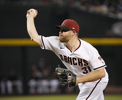 Jun 13, 2022; Phoenix, Arizona, U.S.; Arizona Diamondbacks relief pitcher Ian Kennedy (31) throws against the Cincinnati Reds during the ninth inning at Chase Field.

Mlb Reds At Diamondbacks Cincinnati Reds At Arizona Diamondbacks