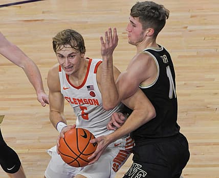Dec 2, 2022; Clemson, SC, USA;  Clemson forward Hunter Tyson (5) gets ready to shoot near Wake Forest forward Andrew Carr (11) during the second half at Littlejohn Coliseum Friday, December 2, 2022. Mandatory Credit: Ken Ruinard/USA TODAY-USA TODAY NETWORK