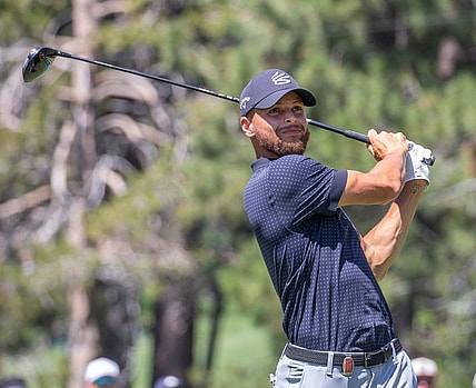 Stephen Curry hits atee shot on the 18th hole during the final round of the American Century Celebrity Championship golf tournament at Edgewood Tahoe Golf Course in Stateline, Nev., Sunday, July 16, 2023.