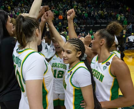 Oregon players come together at midcourt after their win over Rice in the 2023 WNIT second round game in Eugene March 20, 2023.

Ncaa Womens Basketball Uo Wbb In Nit Rice At Oregon