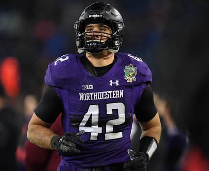 Dec 29, 2017; Nashville, TN, USA; Northwestern Wildcats linebacker Paddy Fisher (42) leaves the field after being ejected for targeting during the first half against the Kentucky Wildcats in the 2017 Music Bowl at Nissan Stadium. Mandatory Credit: Christopher Hanewinckel-USA TODAY Sports