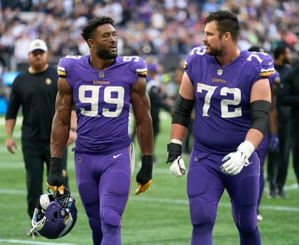 Oct 2, 2022;  London, United Kingdom;  Minnesota Vikings linebacker Danielle Hunter (99) and Minnesota Vikings guard Ezra Cleveland (72) during the NFL International Series game at Tottenham Hotspur Stadium. Mandatory Credit: Peter van den Berg-USA TODAY Sports