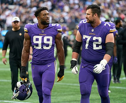 Oct 2, 2022;  London, United Kingdom;  Minnesota Vikings linebacker Danielle Hunter (99) and Minnesota Vikings guard Ezra Cleveland (72) during the NFL International Series game at Tottenham Hotspur Stadium. Mandatory Credit: Peter van den Berg-USA TODAY Sports