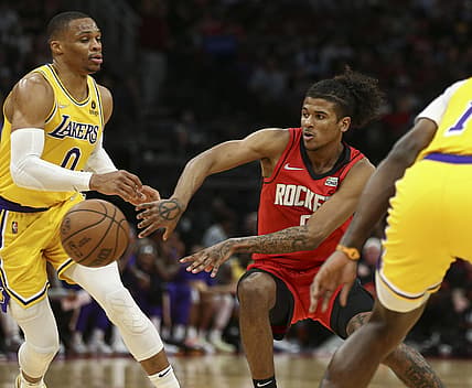 Dec 28, 2021; Houston, Texas, USA; Houston Rockets guard Jalen Green (0) passes the ball during the game against the Los Angeles Lakers at Toyota Center. Mandatory Credit: Troy Taormina-USA TODAY Sports
